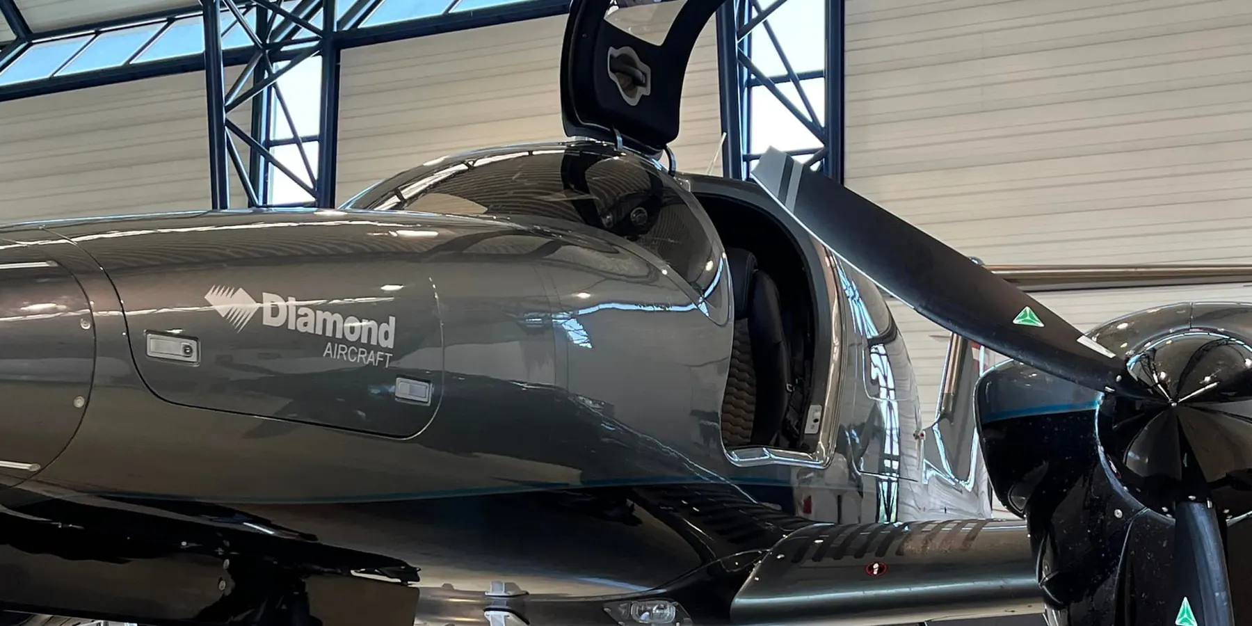 Diamond DA42 twin-engine aircraft inside the Swift Aero hangar at Sywell Aerodrome